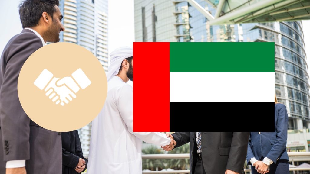 Twee mensen die elkaar de hand schudden in Dubai ter illustratie van een local sponsor in Dubai